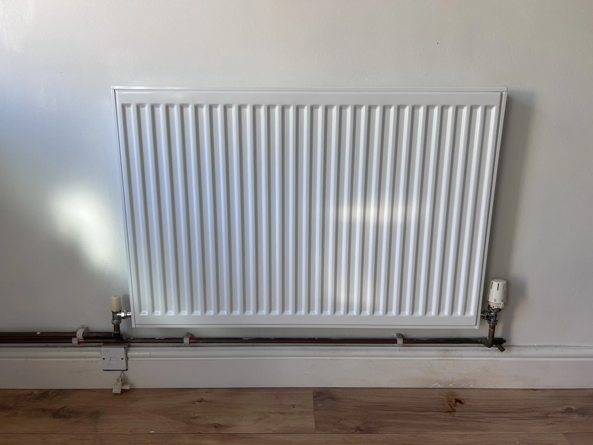 Radiator and heating system upgrade by JSW Heating Solutions in Surrey
